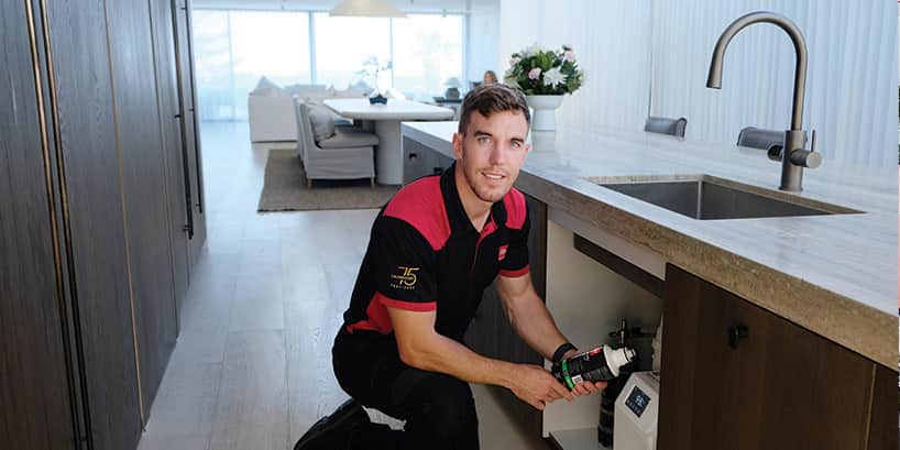 Technician servicing HydroTap